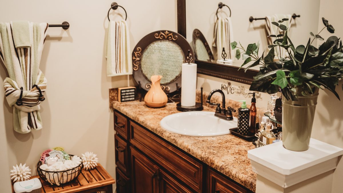 Cozy bathroom vanity with mirror and plants